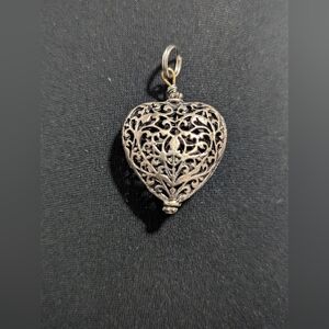 Elegant Silver Heart Pendant